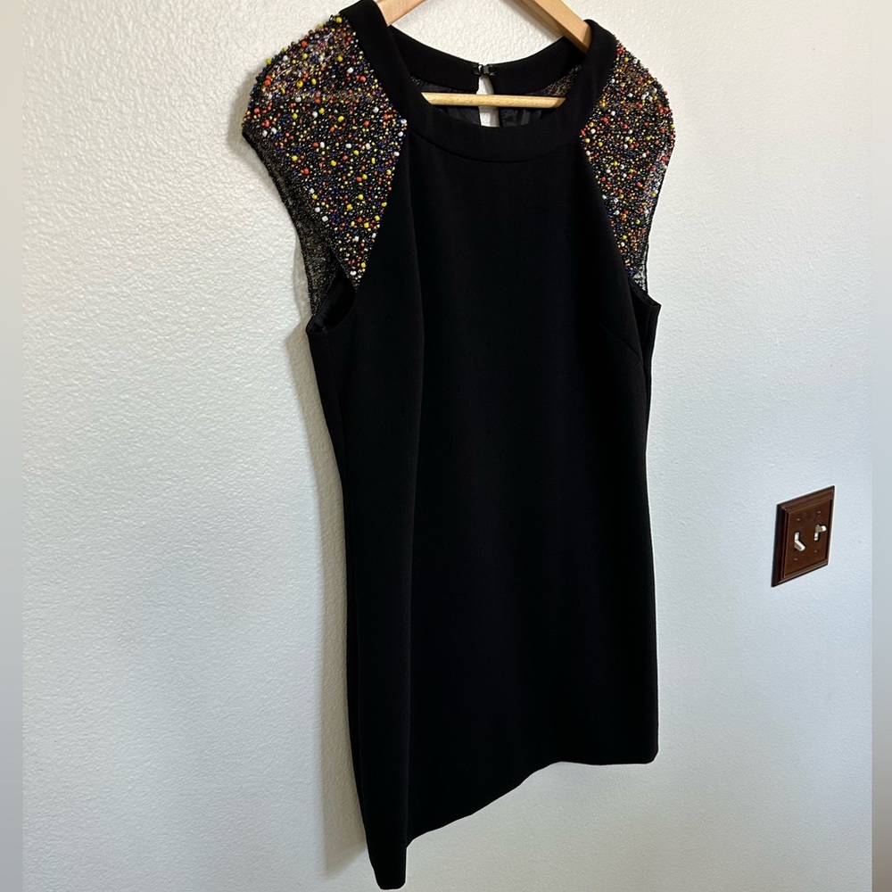 Trina Turk Black with Embellished sleeves Mini Dress.